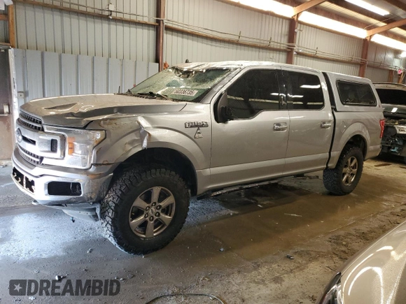 2020 Ford F-150 XL with VIN 1FTEW1E57LKF44499, listed as a Copart auction lot 60336735 with 156,745 mi miles and Salvage title. Bid and sale history available at DreamBid. Image 1.