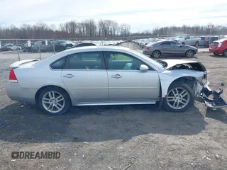 2014 Chevrolet Impala LTZ with VIN 2G1WC5E30E1120094, listed as a IAAI auction lot 41909136 with 117,922 mi miles and . Bid and sale history available at DreamBid. Image 13.