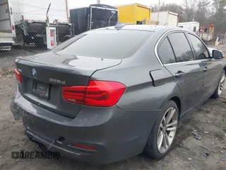 2018 BMW 3 Series with VIN WBA8F1C54JAE93207, listed as a IAAI auction lot 41876781 with 64,749 mi miles and . Bid and sale history available at DreamBid. Image 4.