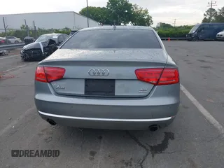 2011 Audi A8 with VIN WAUAVAFD0BN018197, listed as a IAAI auction lot 42221435 with 74,465 mi miles and . Bid and sale history available at DreamBid. Image 17.