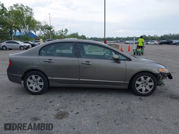 2008 Honda Civic LX with VIN 2HGFA16508H313154, listed as a IAAI auction lot 41879360 with 254,154 mi miles and . Bid and sale history available at DreamBid. Image 14.