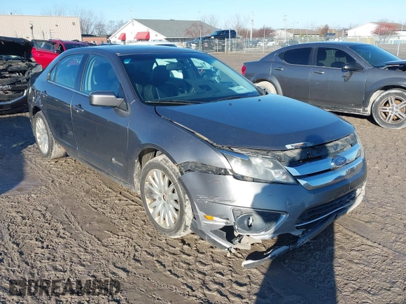 2010 Ford Fusion Hybrid with VIN 3FADP0L39AR125251, listed as a IAAI auction lot 41100606 with 235,612 mi miles. Bid and sale history available at carsss.com. Image 1.