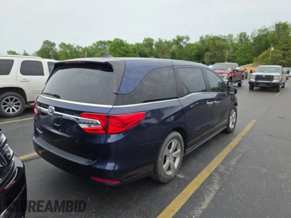 2018 Honda Odyssey EX-L with VIN 5FNRL6H75JB064377, listed as a Copart auction lot 56241905 with 103,651 mi miles and Clean Title. Bid and sale history available at DreamBid. Image 4.
