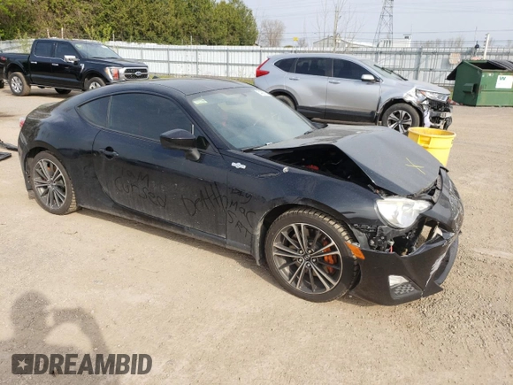 2014 Scion FR-S z VIN JF1ZNAA19E9709220, wystawiony jako Copart lot #54389725 z przebiegiem 123 443 mil mil oraz Szkoda całkowita • Salvage title. Historia ofert i sprzedaży dostępna na DreamBid. Obrazek 4.