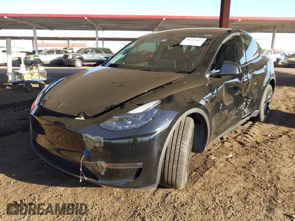 2023 Tesla Model Y Long Range with VIN 7SAYGDEE8PF815622, listed as a IAAI auction lot 41515433 with 70,862 mi miles and . Bid and sale history available at DreamBid. Image 17.