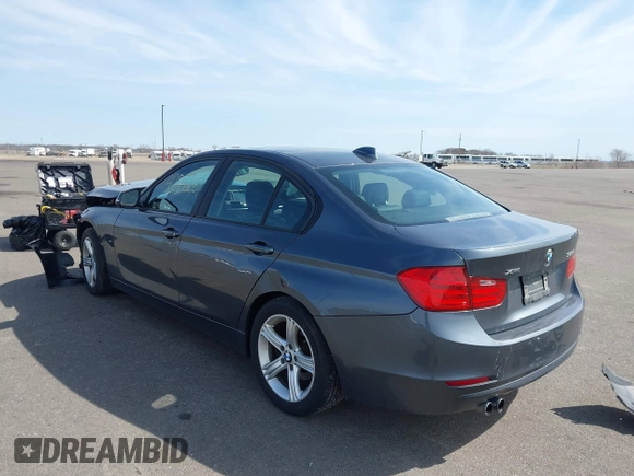2014 BMW 3 Series 328i xDrive with VIN WBA3B5C50EP540357, listed as a IAAI auction lot 42052651 with 139,971 mi miles and . Bid and sale history available at DreamBid. Image 3.