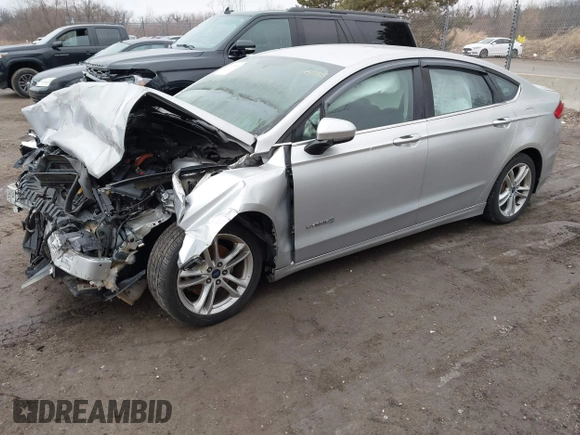 2018 Ford Fusion SE z VIN 3FA6P0LU3JR141401, wystawiony jako IAAI lot #41718444 z przebiegiem Nie podano mil oraz . Historia ofert i sprzedaży dostępna na DreamBid. Obrazek 2.