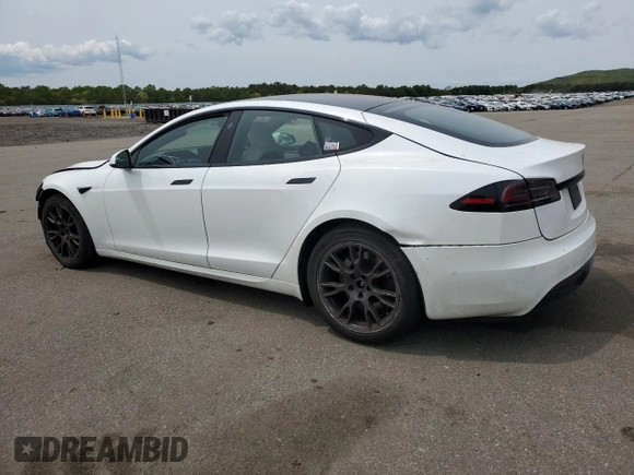 2022 Tesla Model S z VIN 5YJSA1E57NF487187, wystawiony jako Copart lot #58295845 z przebiegiem 50 879 mil mil oraz Szkoda całkowita • Salvage title. Historia ofert i sprzedaży dostępna na DreamBid. Obrazek 2.