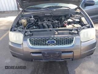 2003 Ford Escape Limited with VIN 1FMCU94173KB02067, listed as a IAAI auction lot 42088659 with 236,209 mi miles. Bid and sale history available at carsss.com. Image 6.