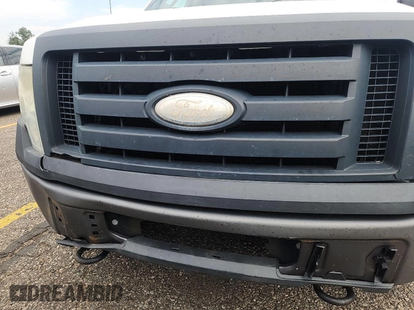 2009 Ford F-150 XL z VIN 1FTPF14V59KA70992, wystawiony jako IAAI lot #42737715 z przebiegiem 257 210 mil mil oraz . Historia ofert i sprzedaży dostępna na DreamBid. Obrazek 13.