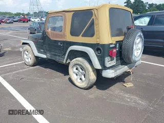 1998 Jeep Wrangler SE with VIN 1J4FY29P8WP793427, listed as a IAAI auction lot 42546515 with 145,388 mi miles and . Bid and sale history available at DreamBid. Image 3.