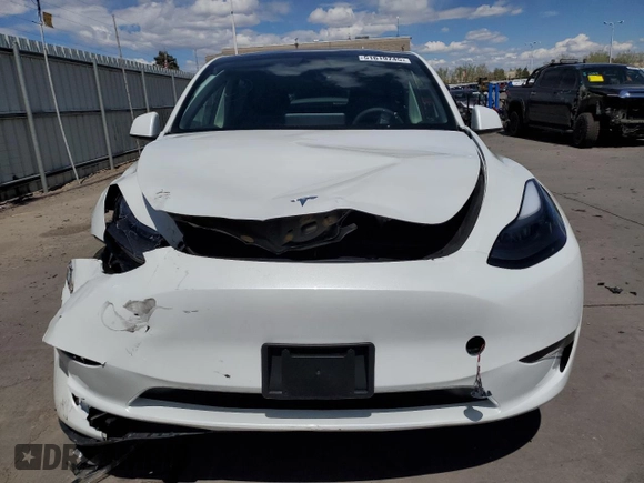 2024 Tesla Model Y Long Range with VIN 7SAYGAEE7RF205700, listed as a Copart auction lot 53814155 with 8,986 mi miles and Salvage Title. Bid and sale history available at DreamBid. Image 5.
