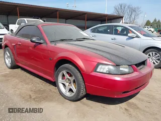 2001 Ford Mustang GT Deluxe z VIN 1FAFP45X61F196100, wystawiony jako IAAI lot #41770079 z przebiegiem 153 257 mil mil oraz . Historia ofert i sprzedaży dostępna na DreamBid. Obrazek 1.