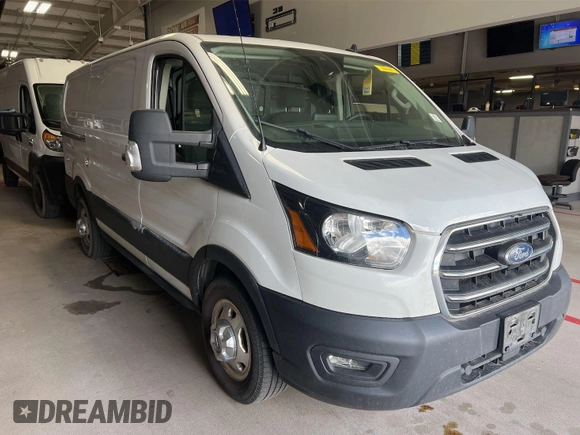 2020 Ford Transit Cargo z VIN 1FTBR2YG5LKA32432, wystawiony jako IAAI lot #42493895 z przebiegiem 134 672 mil mil oraz . Historia ofert i sprzedaży dostępna na DreamBid. Obrazek 23.