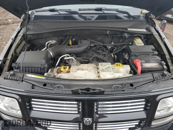 2011 Dodge Nitro Heat with VIN 1D4PT4GK7BW597557, listed as a Copart auction lot 58973335 with 180,958 mi miles and Salvage title. Bid and sale history available at DreamBid. Image 11.