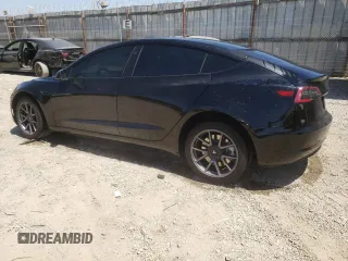 2023 Tesla Model 3 with VIN 5YJ3E1EA4PF558175, listed as a Copart auction lot 67586104 with 32,755 mi miles and Salvage title. Bid and sale history available at DreamBid. Image 2.