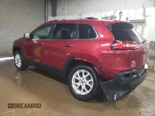 2015 Jeep Cherokee Latitude with VIN 1C4PJMCS5FW624799, listed as a Copart auction lot 52339795 with 142,681 mi miles and Salvage Title. Bid and sale history available at DreamBid. Image 2.