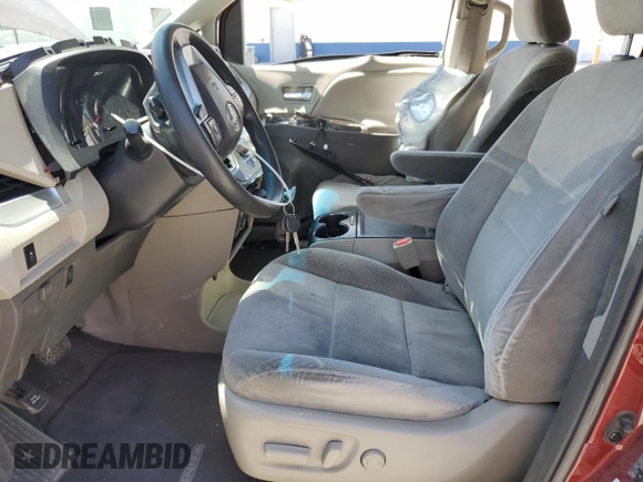 2015 Toyota Sienna LE AAS with VIN 5TDKK3DC2FS604910, listed as a Copart auction lot 59231605 with 118,974 mi miles and Salvage title. Bid and sale history available at DreamBid. Image 7.