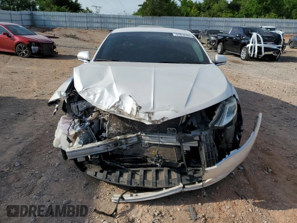 2014 Lincoln MKZ z VIN 3LN6L2G90ER820731, wystawiony jako Copart lot #57818185 z przebiegiem 133 133 mil mil oraz Szkoda całkowita • Salvage title. Historia ofert i sprzedaży dostępna na DreamBid. Obrazek 5.