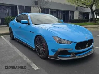 2014 Maserati Ghibli S Q4 z VIN ZAM57RTA7E1089301, wystawiony jako Copart lot #54070585 z przebiegiem 59 787 mil mil oraz Szkody całkowita. Historia ofert i sprzedaży dostępna na DreamBid. Obrazek 1.