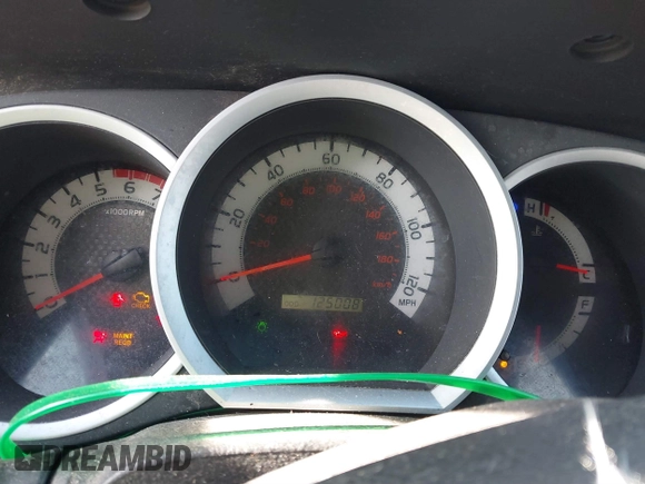 2014 Toyota Tacoma with VIN 3TMLU4EN3EM143882, listed as a IAAI auction lot 40657975 with 125,008 mi miles. Bid and sale history available at carsss.com. Image 7.
