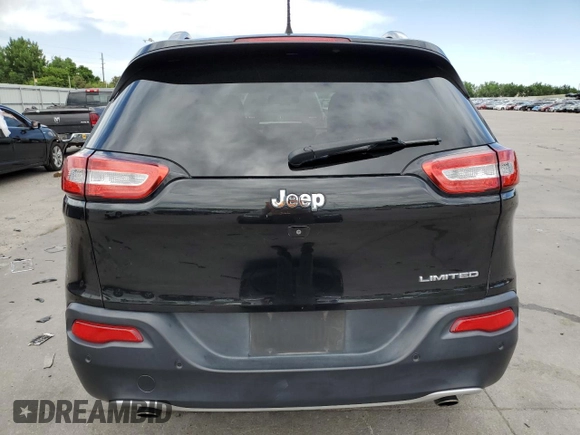 2014 Jeep Cherokee Limited with VIN 1C4PJLDS0EW148212, listed as a Copart auction lot 60464965 with 82,015 mi miles and Salvage title. Bid and sale history available at DreamBid. Image 6.