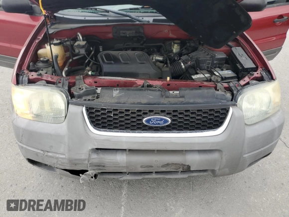 2004 Ford Escape XLT z VIN 1FMYU03104KB51972, wystawiony jako Copart lot #62119665 z przebiegiem 121 785 mil mil oraz Szkoda całkowita • Salvage title. Historia ofert i sprzedaży dostępna na DreamBid. Obrazek 11.