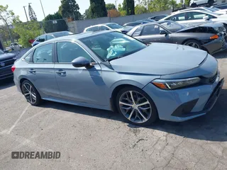 2023 Honda Civic Touring with VIN 2HGFE1F92PH322377, listed as a IAAI auction lot 42361473 with 43,533 mi miles and . Bid and sale history available at DreamBid. Image 12.