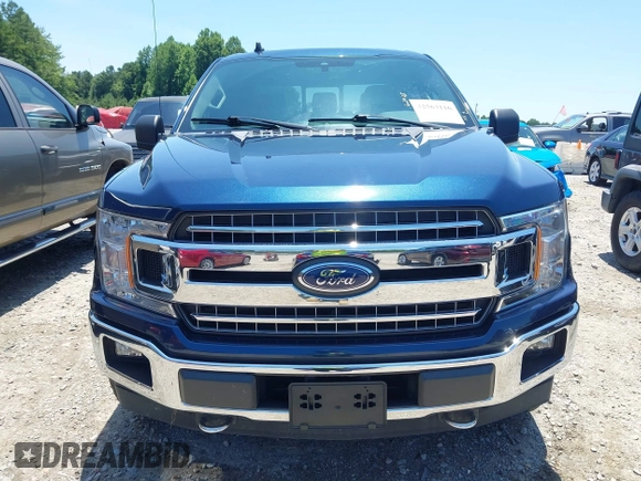 2019 Ford F-150 XL with VIN 1FTEW1E48KFC79350, listed as a IAAI auction lot 42563116 with 73,181 mi miles and . Bid and sale history available at DreamBid. Image 12.