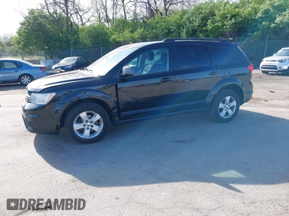 2012 Dodge Journey SXT with VIN 3C4PDDBGXCT160348, listed as a IAAI auction lot 42096075 with 135,095 mi miles and . Bid and sale history available at DreamBid. Image 2.