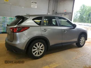 2013 Mazda CX-5 Sport with VIN JM3KE2BE6D0110272, listed as a Copart auction lot 57570725 with 124,475 mi miles and Salvage title. Bid and sale history available at DreamBid. Image 3.