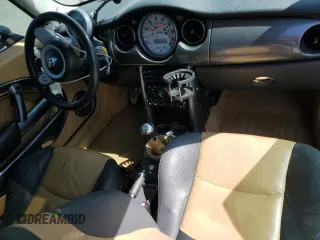 2006 MINI Hardtop S z VIN WMWRE33576TN27734, wystawiony jako Copart lot #54186405 z przebiegiem 149 045 mil mil oraz Szkoda całkowita • Salvage title. Historia ofert i sprzedaży dostępna na DreamBid. Obrazek 8.