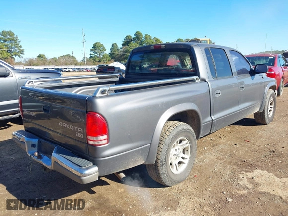 2003 Dodge Dakota SLT with VIN 1D7HL48X03S174569, listed as a IAAI auction lot 41159169 with 156,551 mi miles. Bid and sale history available at carsss.com. Image 4.