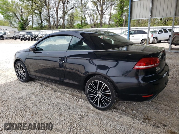 2013 Volkswagen Eos Komfort with VIN WVWBW8AH1DV001953, listed as a Copart auction lot 54167185 with 118,696 mi miles and Clean Title. Bid and sale history available at DreamBid. Image 2.