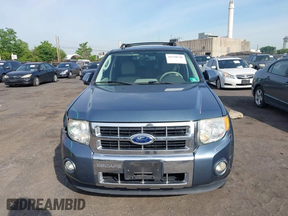 2011 Ford Escape Hybrid z VIN 1FMCU4K38BKC60181, wystawiony jako IAAI lot #42330726 z przebiegiem 209 390 mil mil oraz . Historia ofert i sprzedaży dostępna na DreamBid. Obrazek 13.