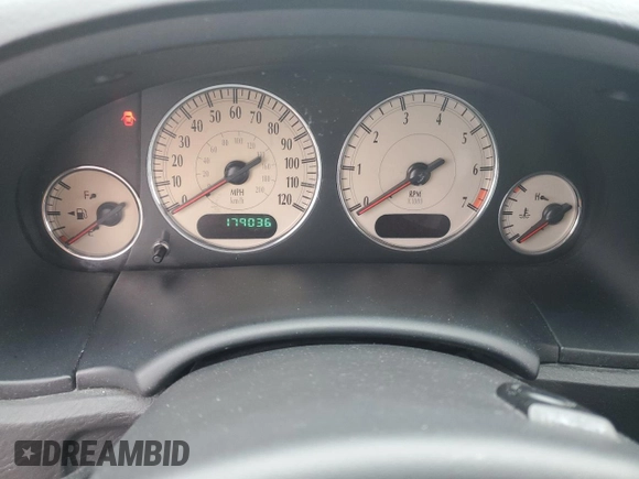 2004 Chrysler Town & Country Limited with VIN 2C8GP64L94R575502, listed as a Copart auction lot 61746354 with 179,036 mi miles and Salvage Title. Bid and sale history available at DreamBid. Image 9.