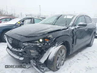 2023 Mazda CX-30 S Preferred z VIN 3MVDMBCM5PM538960, wystawiony jako IAAI lot #41273300 z przebiegiem 22 846 mil mil oraz . Historia ofert i sprzedaży dostępna na DreamBid. Obrazek 6.