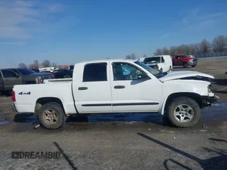 2005 Dodge Dakota SLT with VIN 1D7HW48N85S226460, listed as a IAAI auction lot 41568128 with 213,159 mi miles and . Bid and sale history available at carsss.com. Image 13.