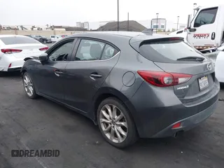 2014 Mazda 3 s Touring with VIN JM1BM1L35E1208952, listed as a IAAI auction lot 42121077 with 183,985 mi miles. Bid and sale history available at carsss.com. Image 15.