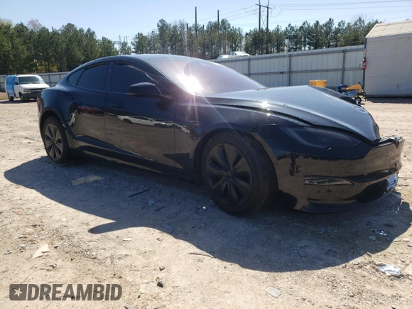 2023 Tesla Model S with VIN 5YJSA1E59PF526333, listed as a Copart auction lot 50607085 with Not provided miles and Salvage title. Bid and sale history available at DreamBid. Image 4.