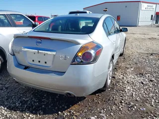2012 Nissan Altima 3.5 SR with VIN 1N4BL2AP9CN566002, listed as a IAAI auction lot 41731360 with 84,265 mi miles. Bid and sale history available at carsss.com. Image 4.