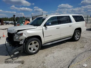 2015 Chevrolet Suburban LTZ with VIN 1GNSKKKC6FR119849, listed as a Copart auction lot 47176815 with 67,235 mi miles and Salvage Title. Bid and sale history available at carsss.com. Image 1.