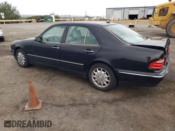 2000 Mercedes-Benz E-Class with VIN WDBJF65J5YB068297, listed as a Copart auction lot 69199004 with 236,751 mi miles and Salvage Title. Bid and sale history available at carsss.com. Image 2.