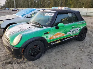 2006 MINI Convertible with VIN WMWRF33526TG16112, listed as a Copart auction lot 78717194 with 204,914 mi miles and Salvage Title. Bid and sale history available at DreamBid. Image 1.