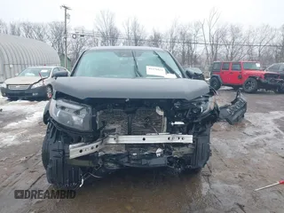 2021 Honda Ridgeline Sport with VIN 5FPYK3F12MB002877, listed as a IAAI auction lot 41576812 with 51,658 mi miles and . Bid and sale history available at DreamBid. Image 6.