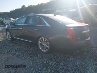 2013 Cadillac XTS Luxury with VIN 2G61P5S3XD9141306, listed as a IAAI auction lot 42034077 with 120,294 mi miles. Bid and sale history available at carsss.com. Image 3.