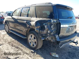 2019 Ford Expedition XLT with VIN 1FMJU1HT5KEA76330, listed as a IAAI auction lot 41171664 with 89,548 mi miles. Bid and sale history available at carsss.com. Image 3.