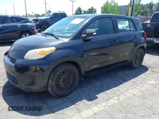 2008 Scion xD with VIN JTKKU10438J014799, listed as a IAAI auction lot 42107563 with 215,136 mi miles. Bid and sale history available at carsss.com. Image 2.