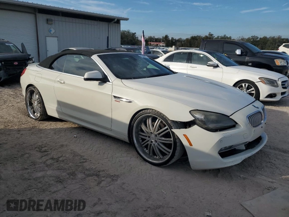 2012 BMW 6 Series 650i z VIN WBALZ3C56CDL72058, wystawiony jako Copart lot #43246815 z przebiegiem 133 048 mil mil oraz Tytuł czysty. Historia ofert i sprzedaży dostępna na DreamBid. Obrazek 4.