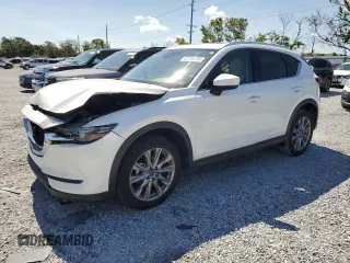 2019 Mazda CX-5 Grand Touring with VIN JM3KFADM7K1558846, listed as a Copart auction lot 62136705 with 24,298 mi miles and Salvage title. Bid and sale history available at DreamBid. Image 1.